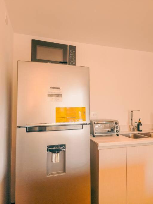 Entire Beautiful Condo With Rooftop Pool And Gym サンサルバドル エクステリア 写真